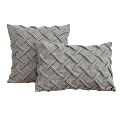 Zwei Kissen Knot von Interior by Hakito in grauem Stoff mit luxuriösem Knoten-Look, ideal für eine stilvolle Einrichtung.
